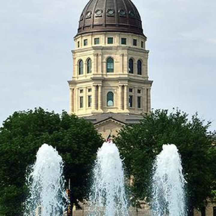 Kansas State Capitol Building with Fountains on a Sunny Day