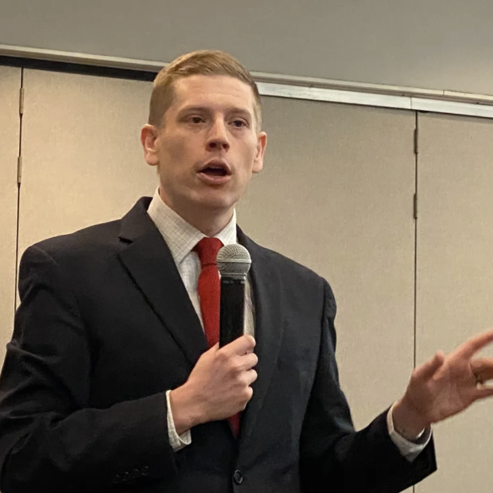 Dr. Micah Kubic spoke at the Reno County Democrats’ monthly meeting at Hutchinson Community College. Kubic spoke on a number of issues concerning voting rights in the state. CREDIT GREG HOLMES