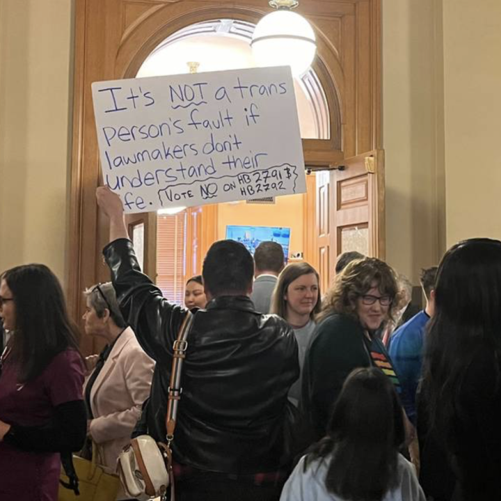 Sign reading, "It's NOT a trans Person's fault if lawmakers don't understand their life."