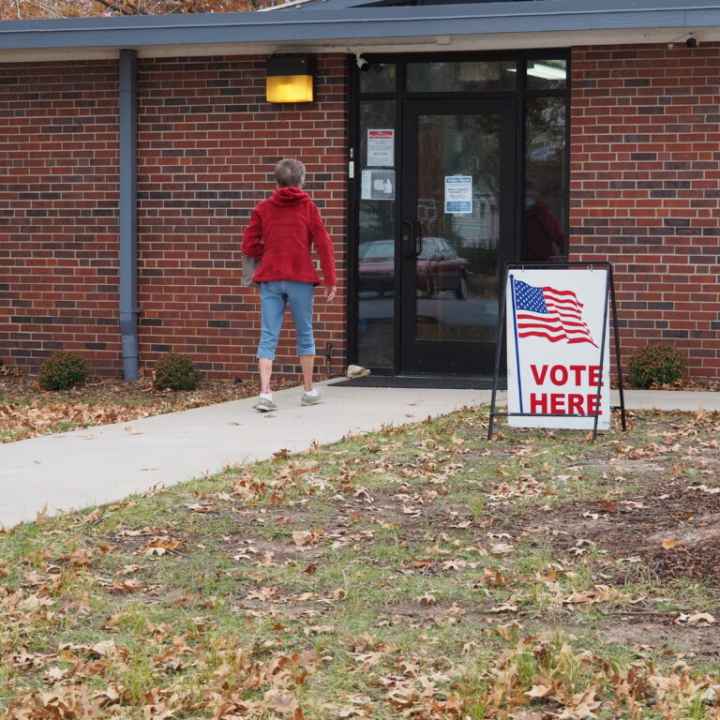 voter at a poll kansas reflector