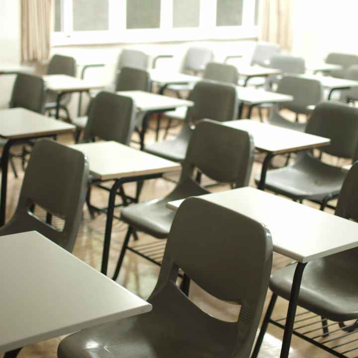 Empty desks in school classroom