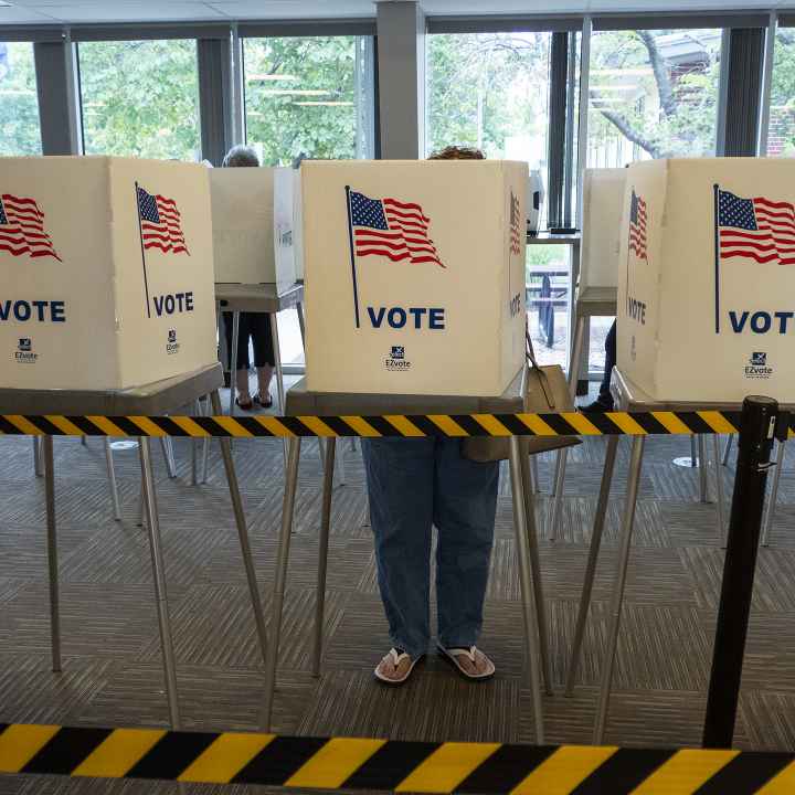  A voter fills out an advance ballot on July 29, 2022, at the Shawnee County Elections Office. (Sherman Smith/Kansas Reflector)