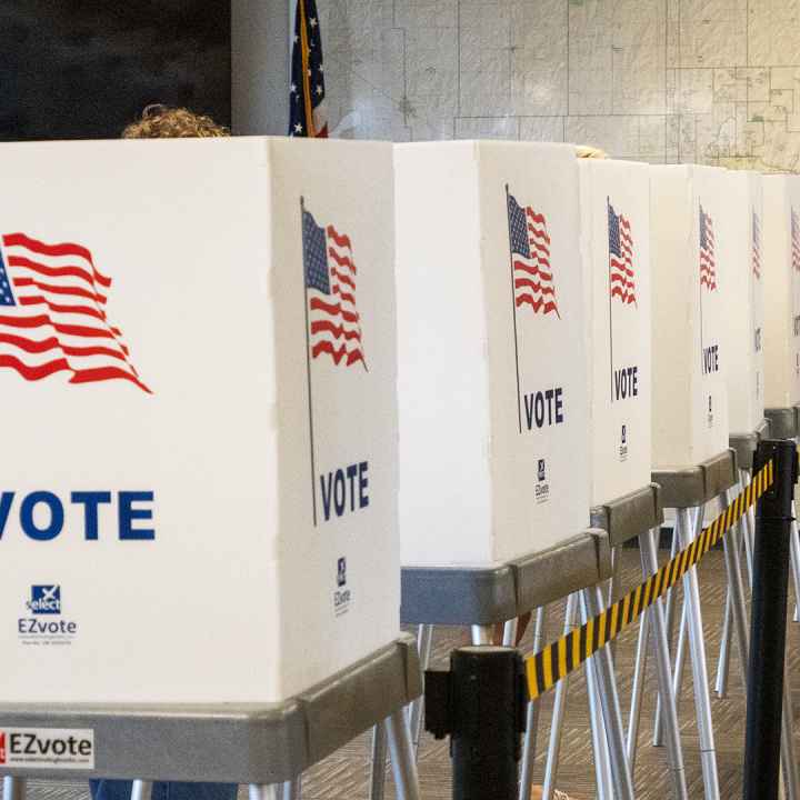  Voting booths stand side by side on July 29, 2022, at the Shawnee County Elections Office. (Sherman Smith/Kansas Reflector)